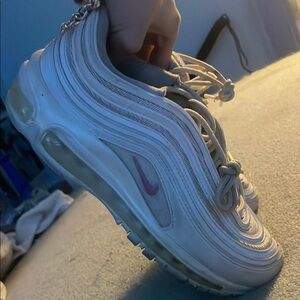 White Sneakers with Purple Swoosh